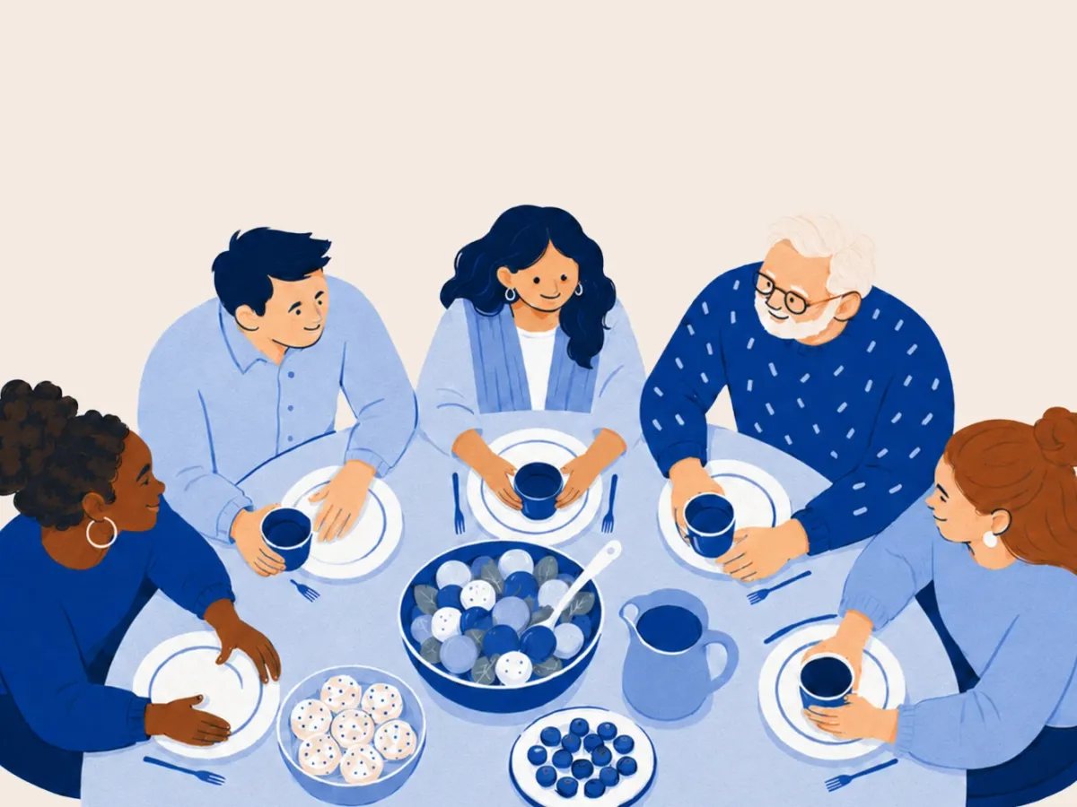 People sharing a relaxed lunch together around a table