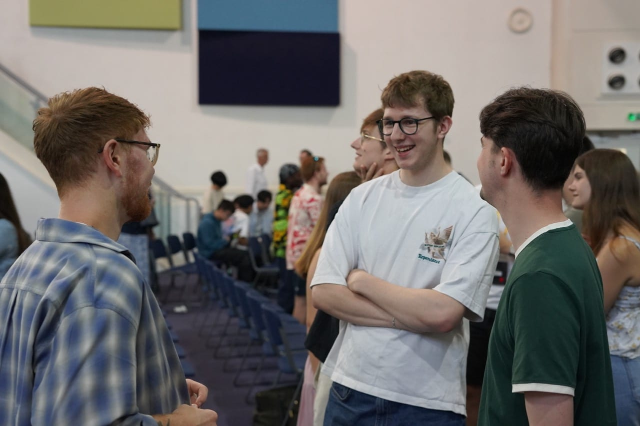 Members of Hope Church chatting together after a service