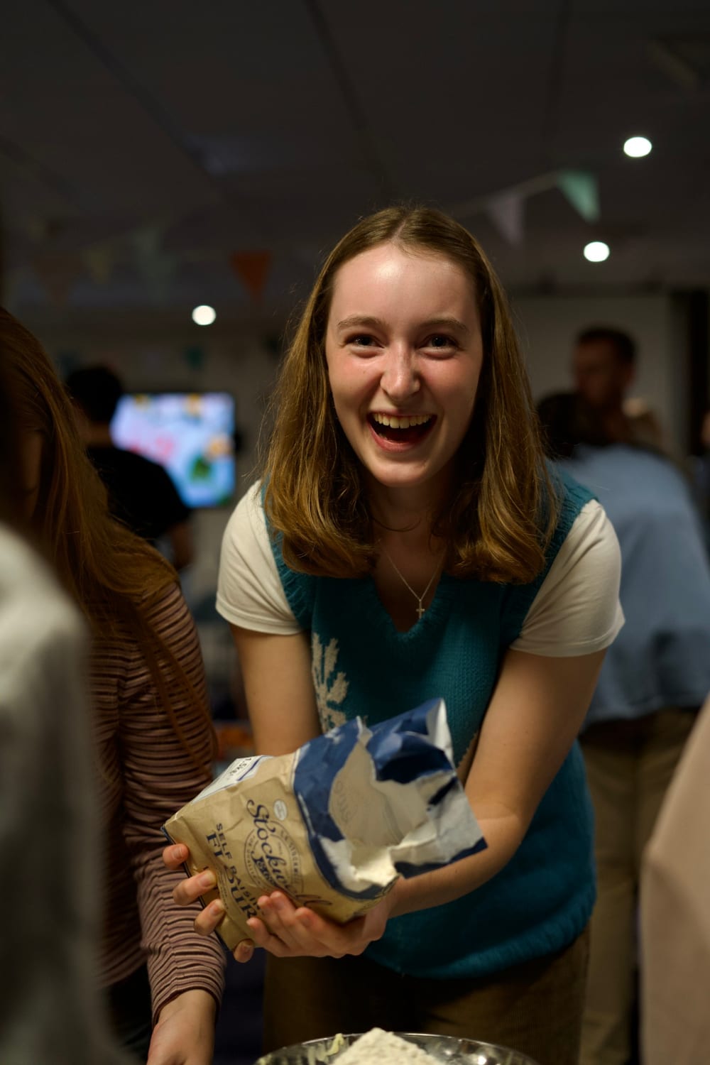 Students laughing together at a social